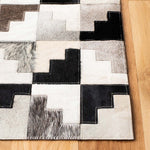 Safavieh Studio Leather 172 Rug, STL172 - Ivory / Black